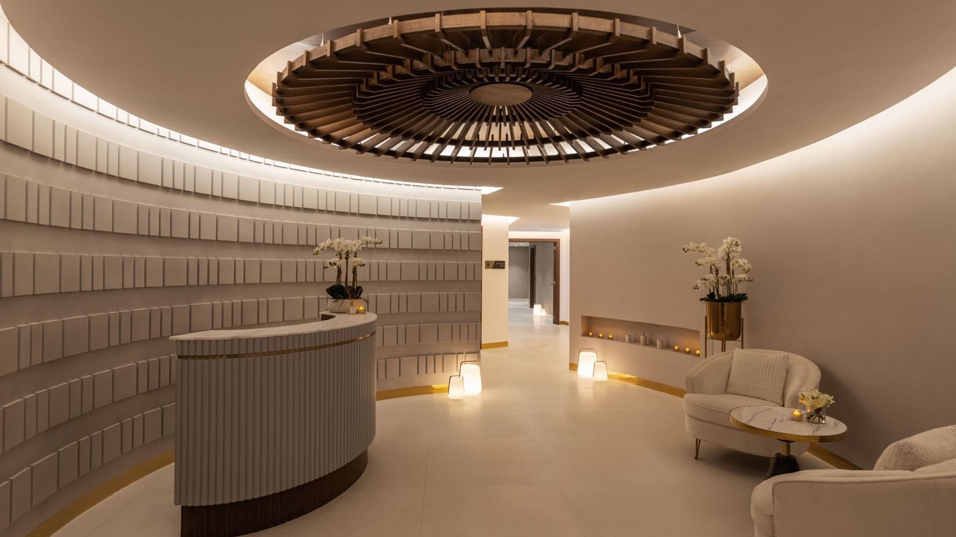 Front desk by lobby lounge area of the Spa at DAMAC Maison Aykon City Hotel Apartments