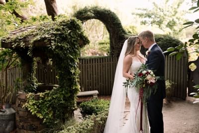 Wedding couple posing in the Garden