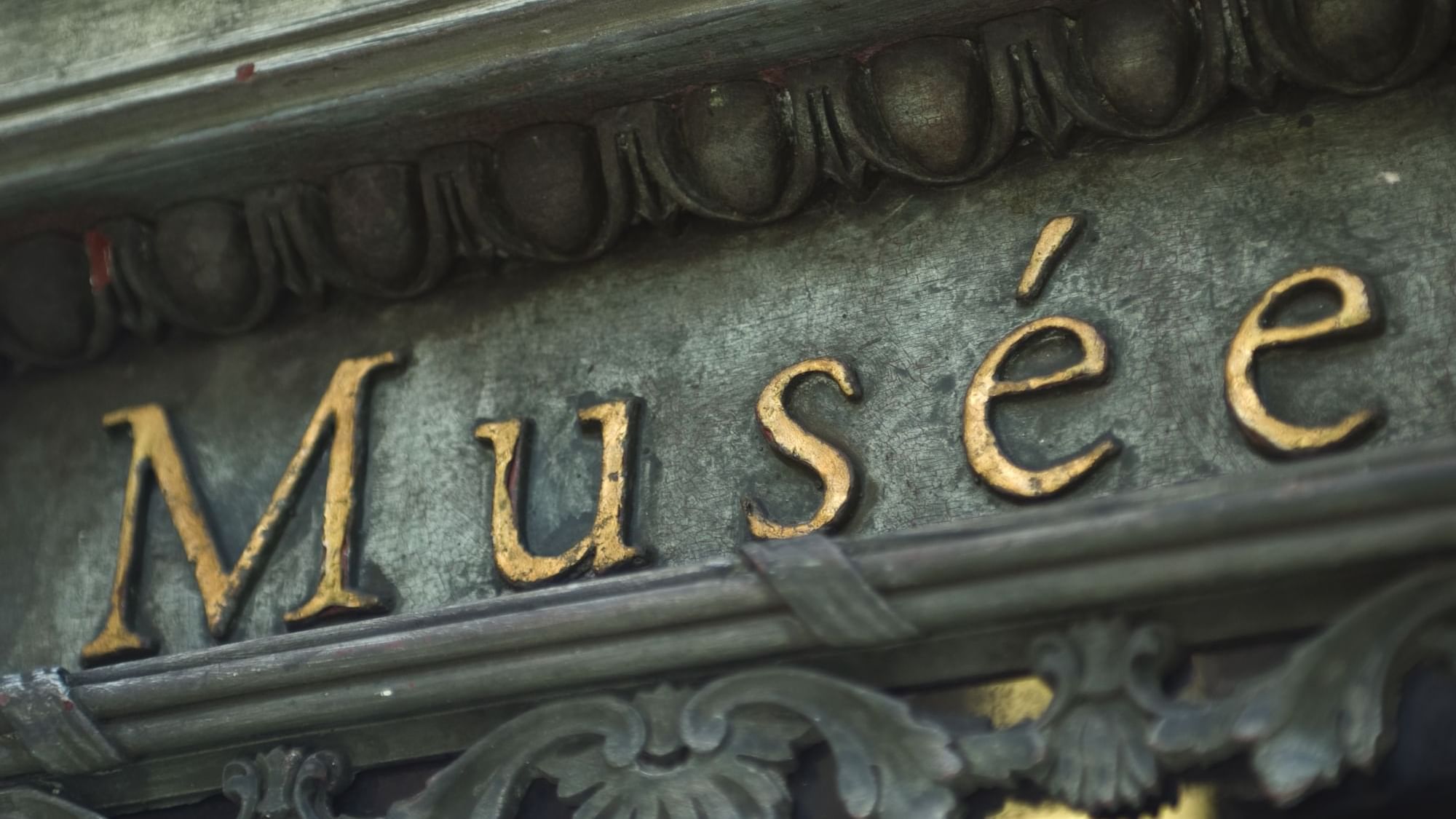 Closeup of the sign of Ursuline Museum near Originals Hotels