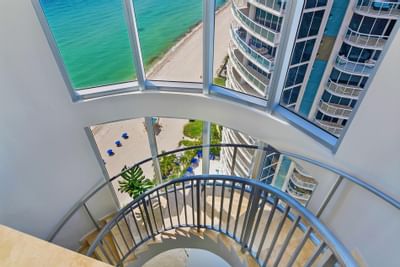 Penthouse stairway with beach view at Marenas Resort Miami