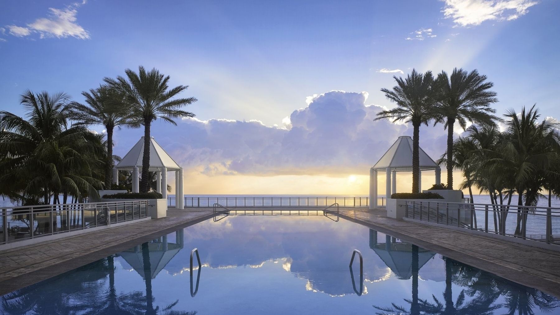 Oceanfront Sunrise Over Diplomat's Infinity Pool at The Diplomat Resort