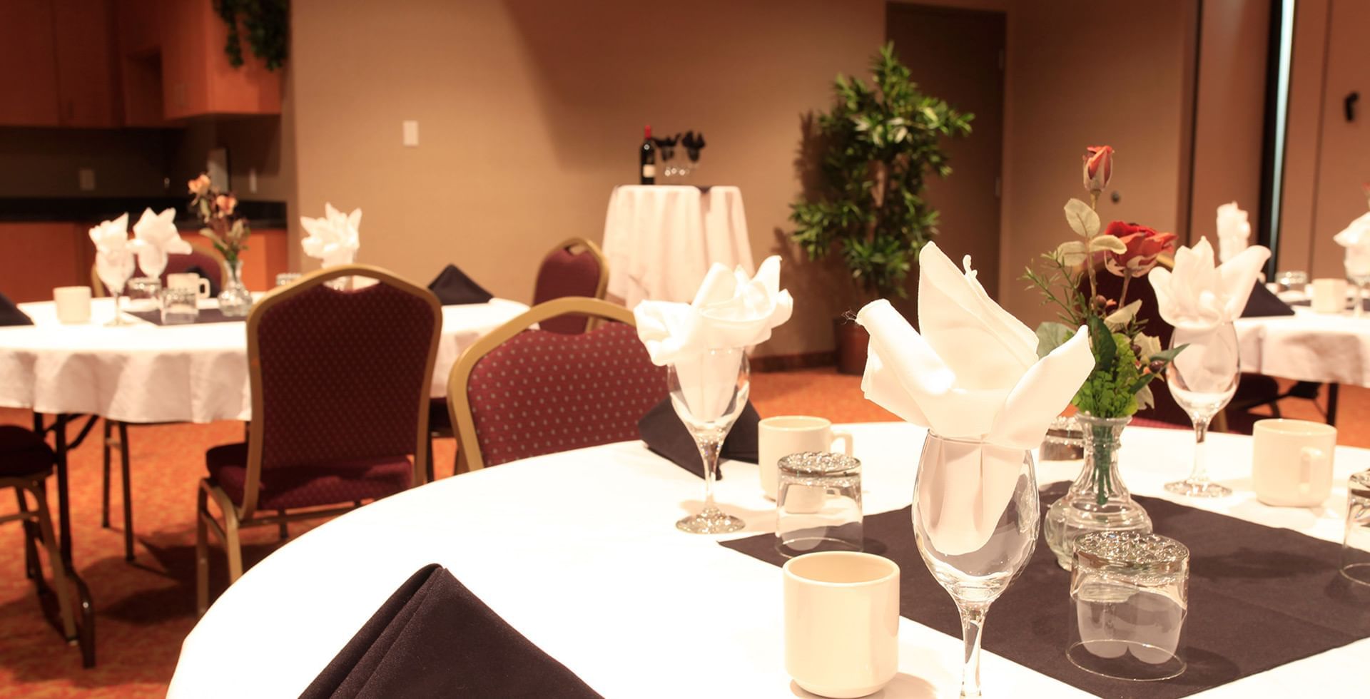 Banquet setup in a ballroom at Coast Fort St. John Hotel