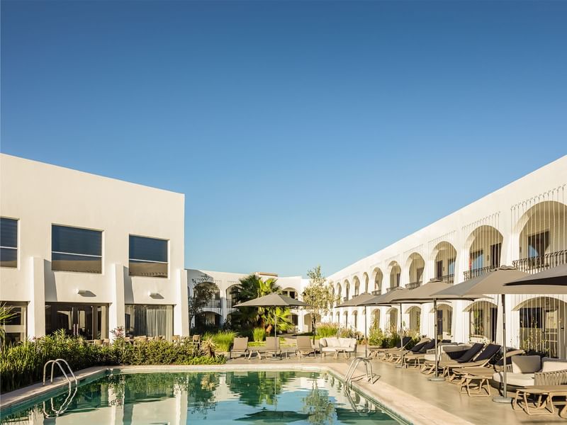 Sunbeds by the outdoor pool, Fiesta Americana Travelty