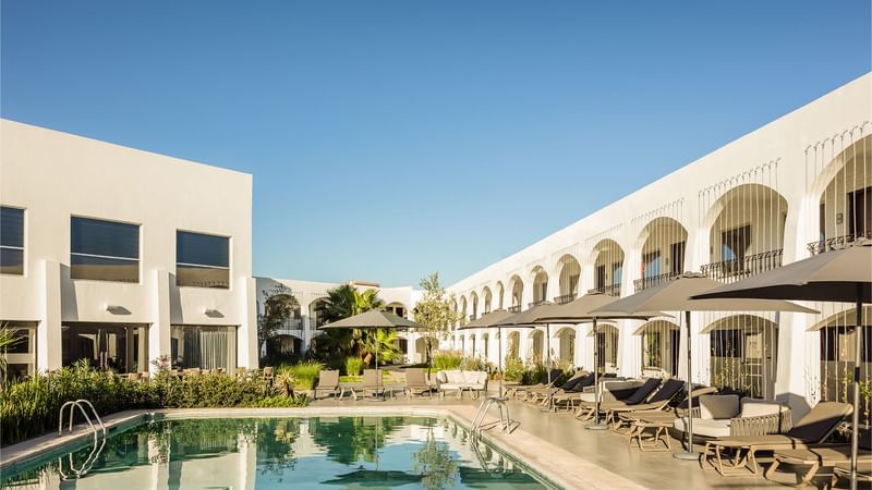 Sunbeds by the outdoor swimming pool at Gamma Ciudad Juarez