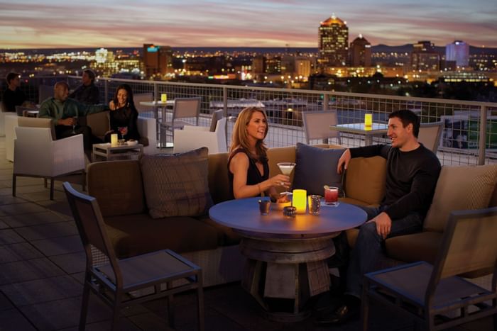 Couple enjoying drinks in Apothecary Lounge, Hotel Parq Central