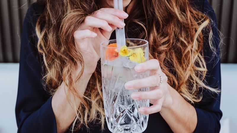 Spring Break Lady with a Cocktail at Almanac Group