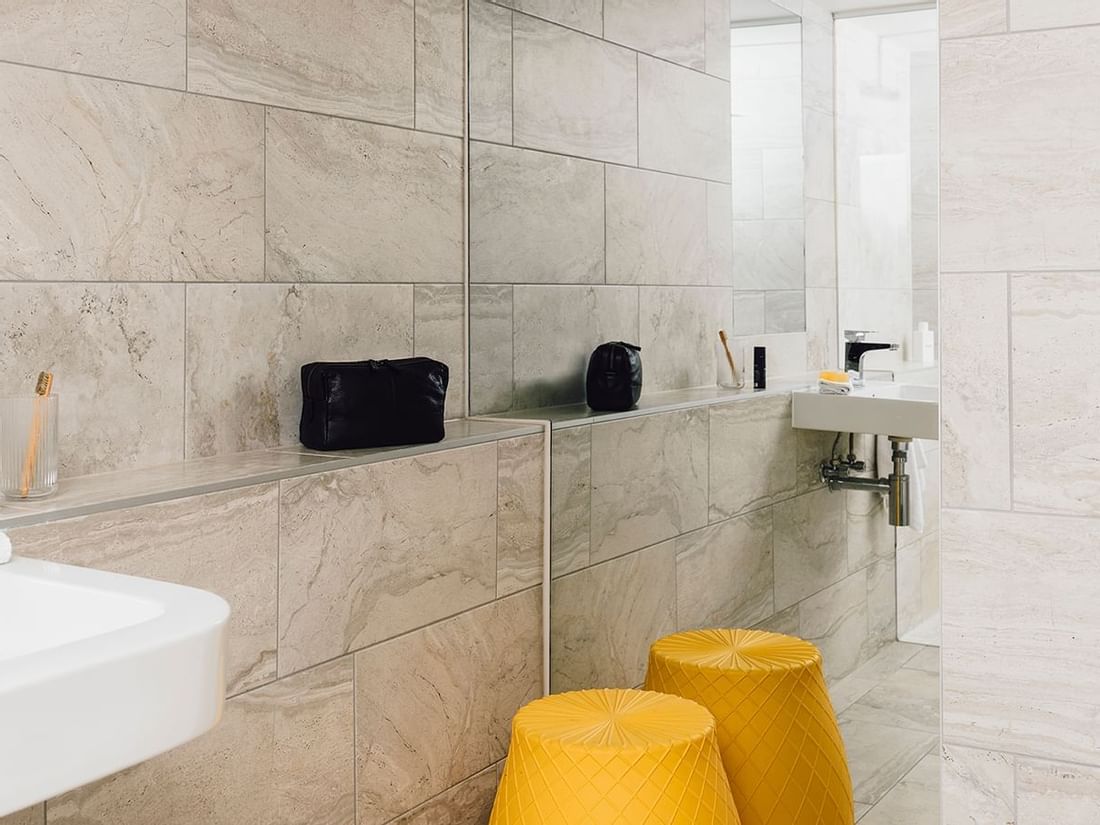 Bathroom shower area in 1 Bedroom Superior Suite with City Views at Quay West Suites Melbourne