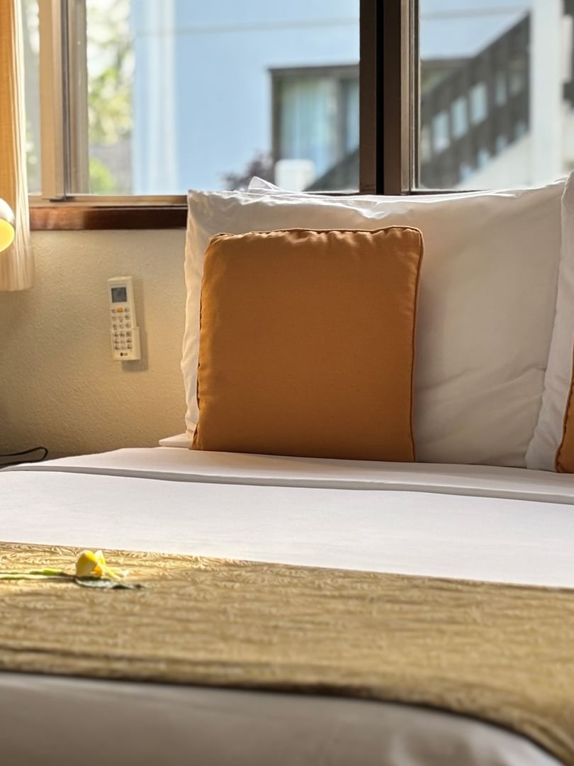 Comfortable Lagoon View Room with large bed and window at Warwick Le Lagon - Vanuatu in Efate.