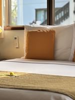 Comfortable Lagoon View Room with large bed and window at Warwick Le Lagon - Vanuatu in Efate.