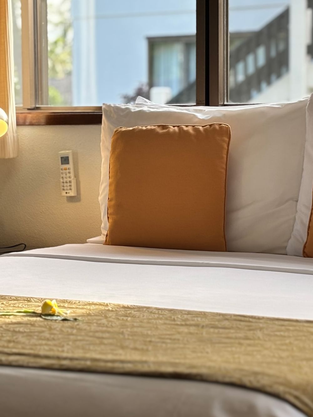 Comfortable Lagoon View Room with large bed and window at Warwick Le Lagon - Vanuatu in Efate.