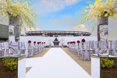 chairs and aisle set for outdoor wedding