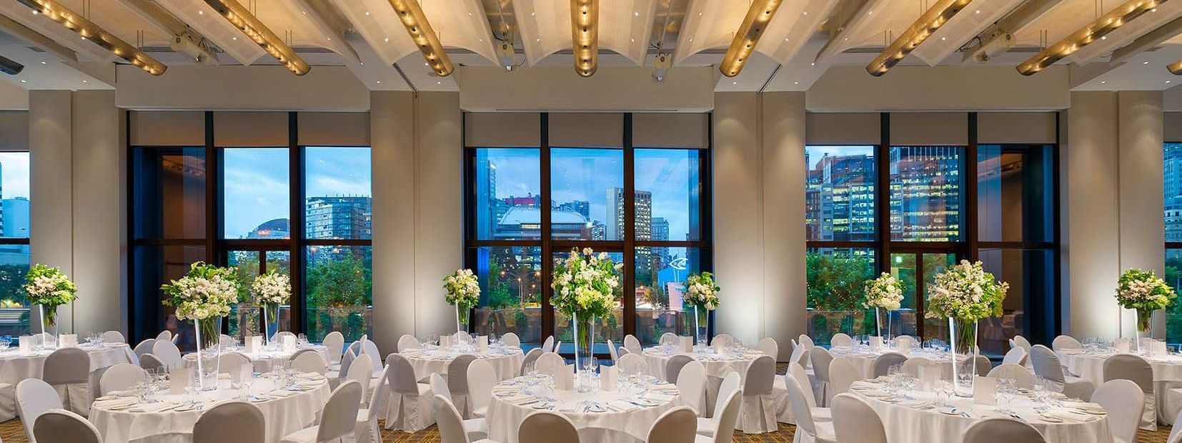 Banquet tables arranged in the River Room at Melbourne hotel