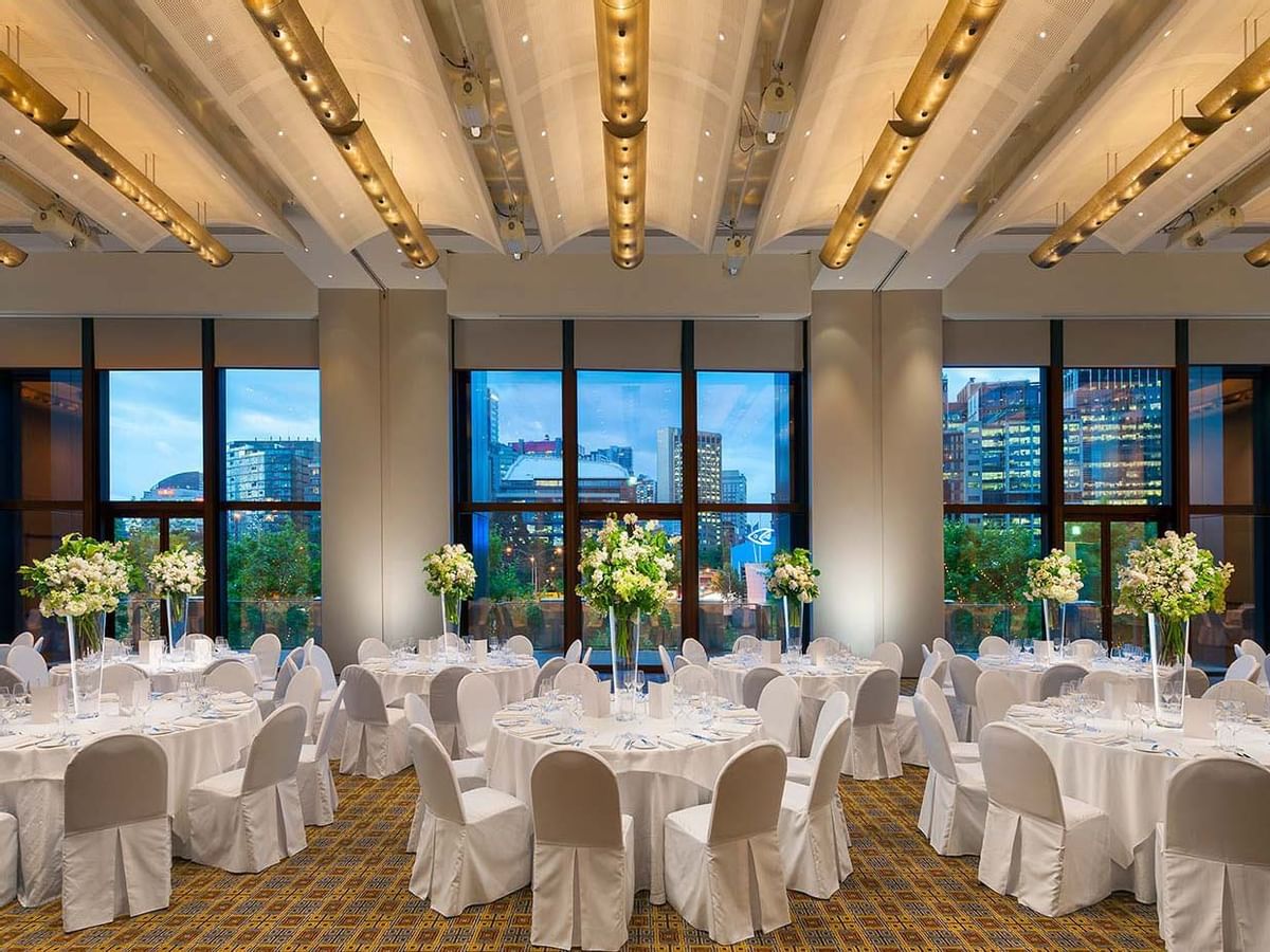 Banquet tables arranged in the River Room at Melbourne hotel