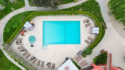 Aerial view of pool with loungers at Manteo Resort Waterfront