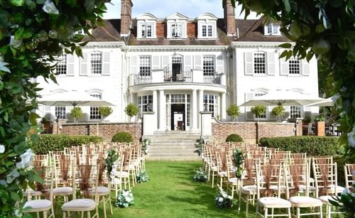 Garden ceremony at Gorse Hill one of the best Asian wedding venues in Surrey
