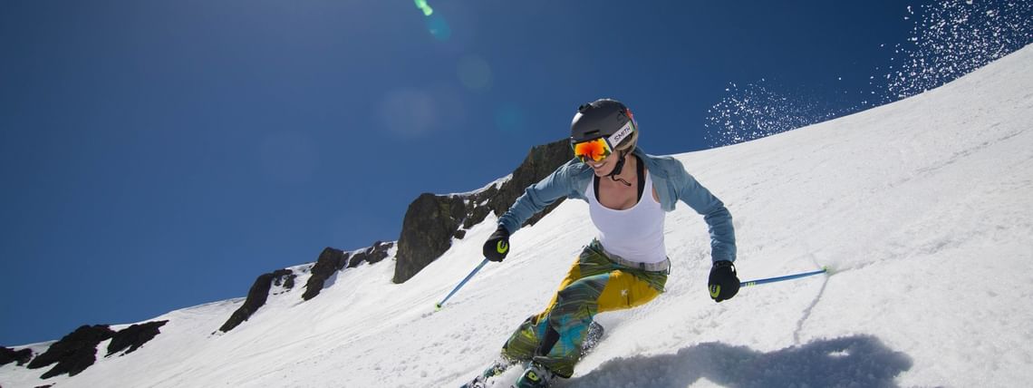 Skier at Palisades Tahoe in Spring