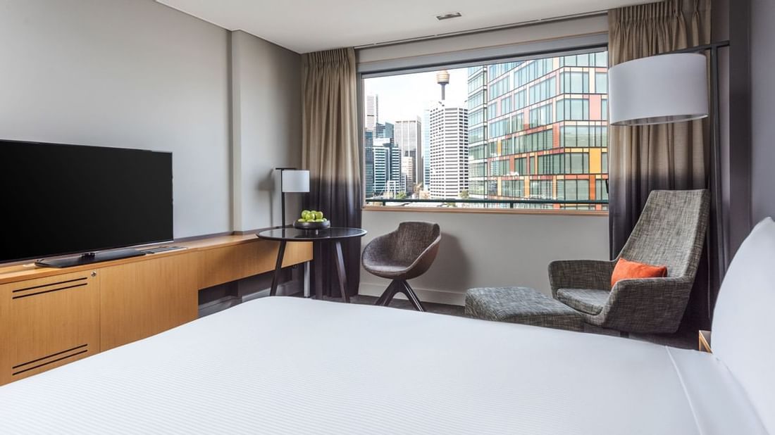 Bedroom with television in Novotel Darling Harbour
