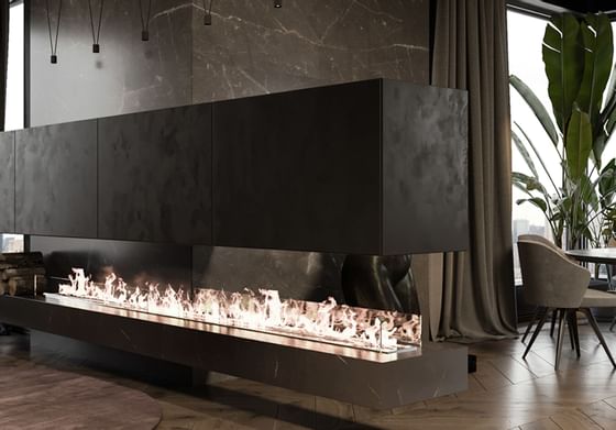 A fire pit in an apartment at Paradox Hotels