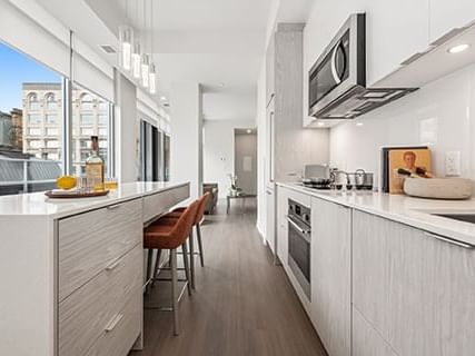 kitchen with an island in 1 bedroom Penthouse at ReStays Ottawa