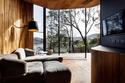 Living area with a mountain view in Coastal Pavilion at Freycinet Lodge