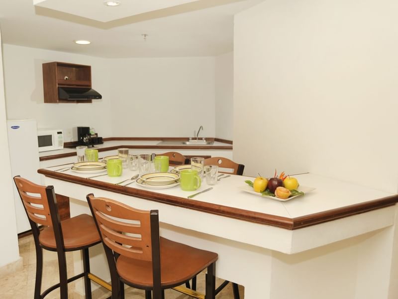 Close-up of a dining table in Master Suite at Gamma Hotels