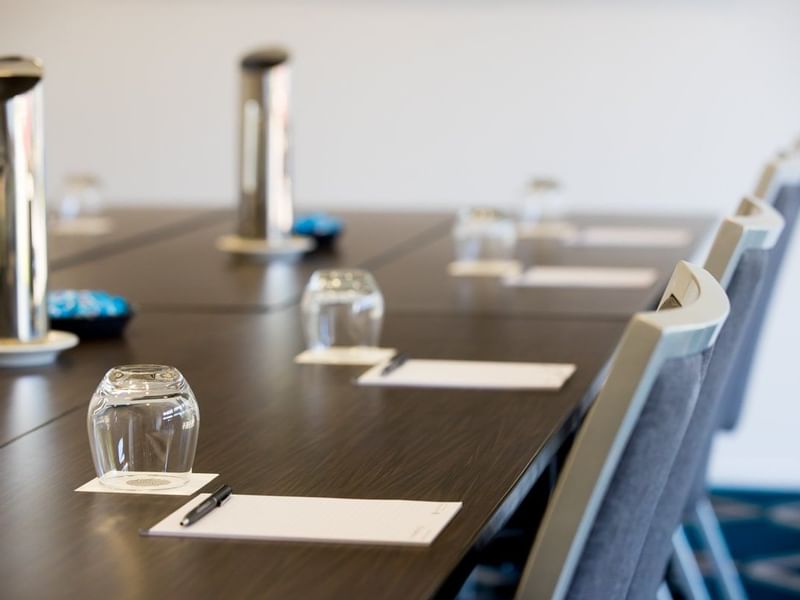Papers with pens on the meeting desk at Pullman Magenta Shores