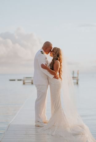 Married couple photoshoot on beach at Copamarina Weddings