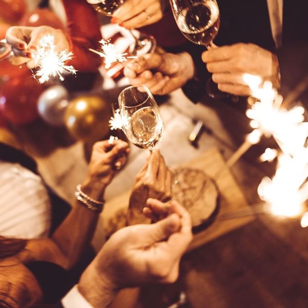 People celebrating New Year's Eve at Falkensteiner Hotels
