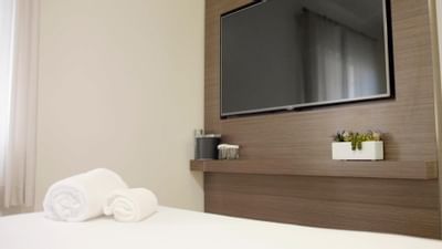 Close-up of wall-mounted TV in a room at The Nest Palo Alto
