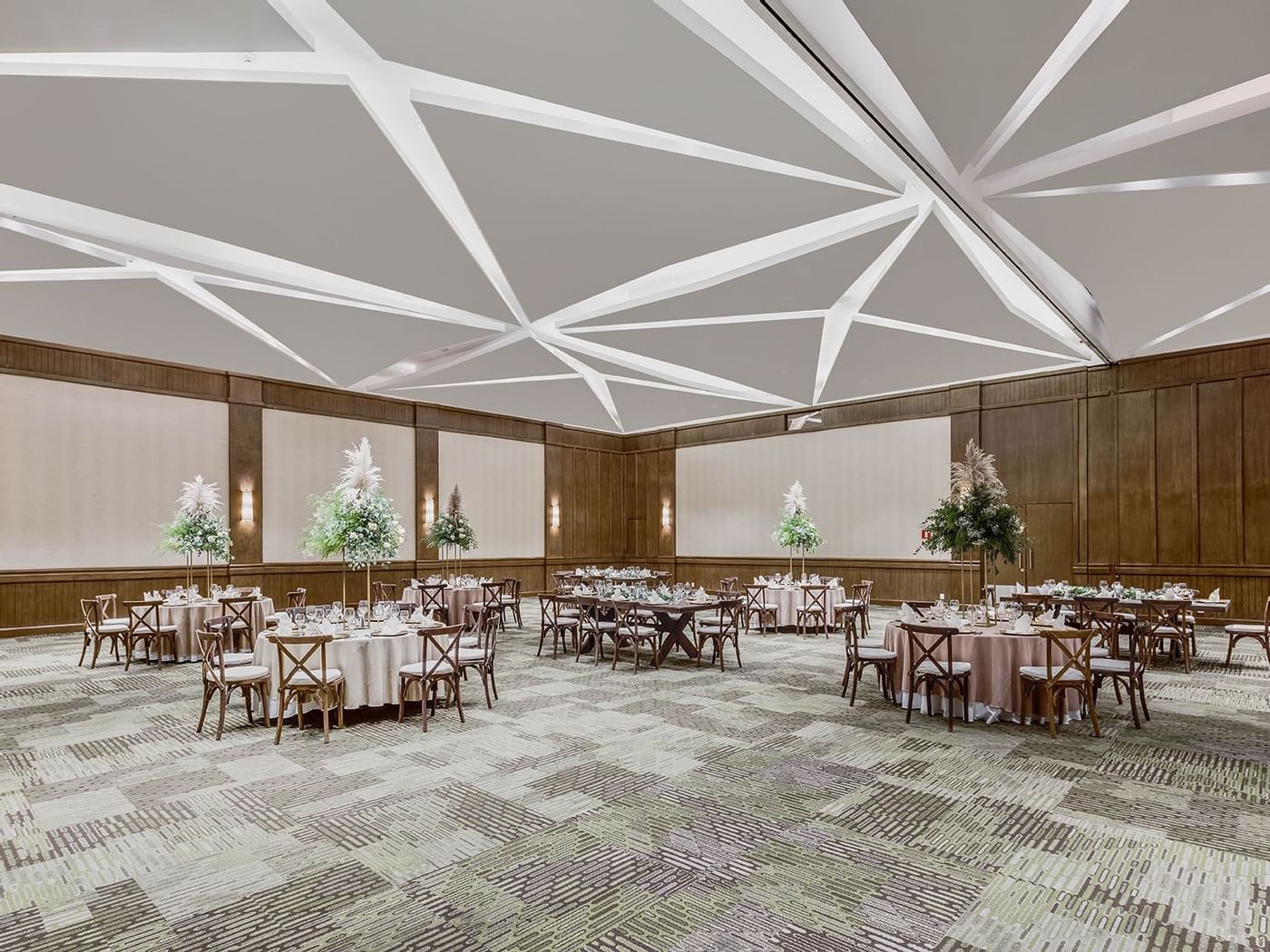 Banquet tables arranged in Tulip at Fiesta Americana Hotels