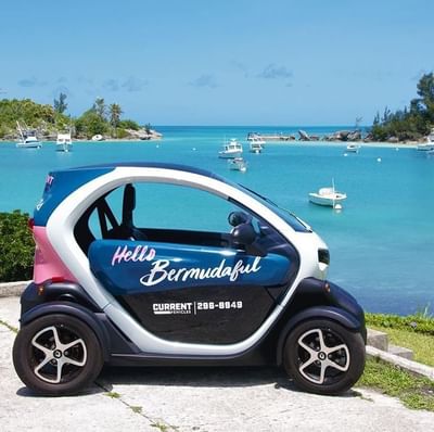 Renault Twizy parked by the ocean near Royal Palms Hotel