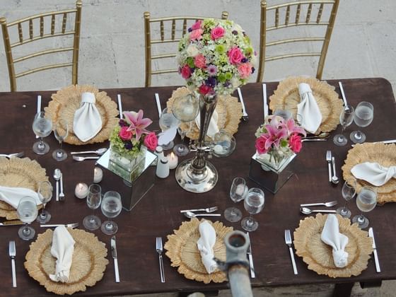 Top view of a table set-up with flowers in The Study at Pensativo House Hotel