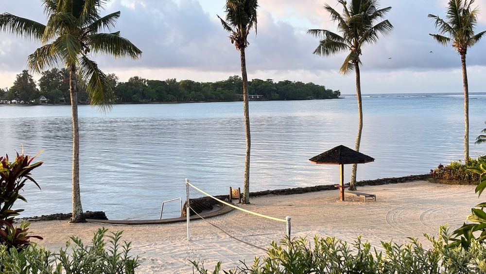 Beach volleyball area under palm trees at Warwick Le Lagon - Vanuatu, Efate.