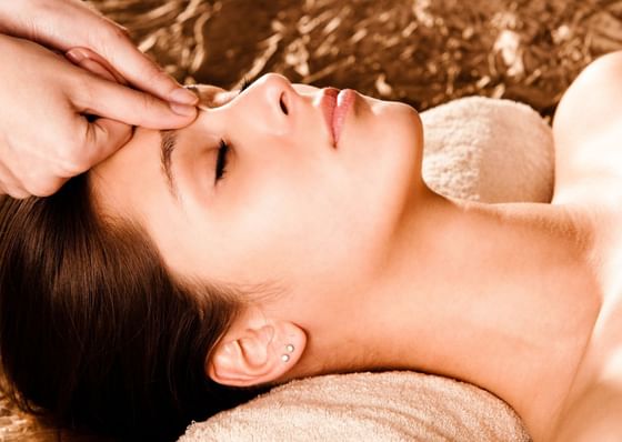 Close-up of lady getting a facial at Honor's Haven