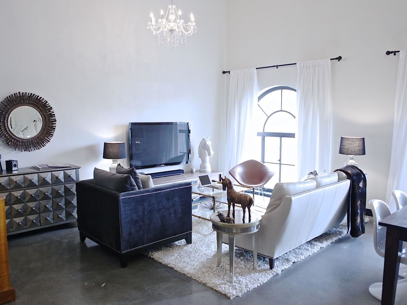 TV lounge area in Penthouse Unit S at The Mayo Hotel