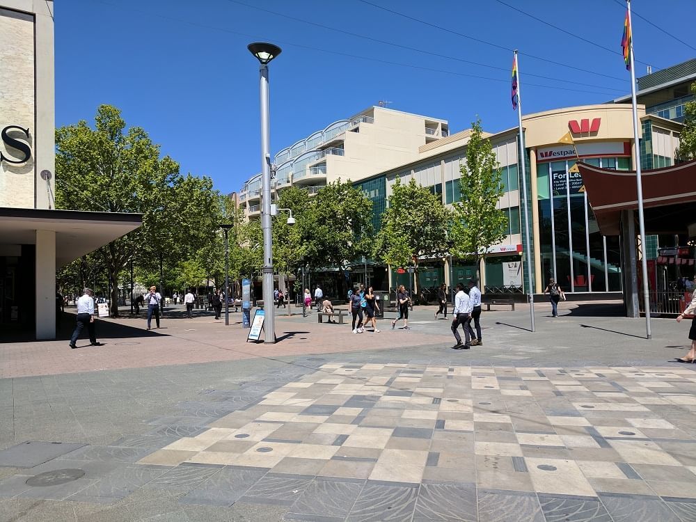 People in Garema Place Street, Nesuto Canberra Apartment Hotel