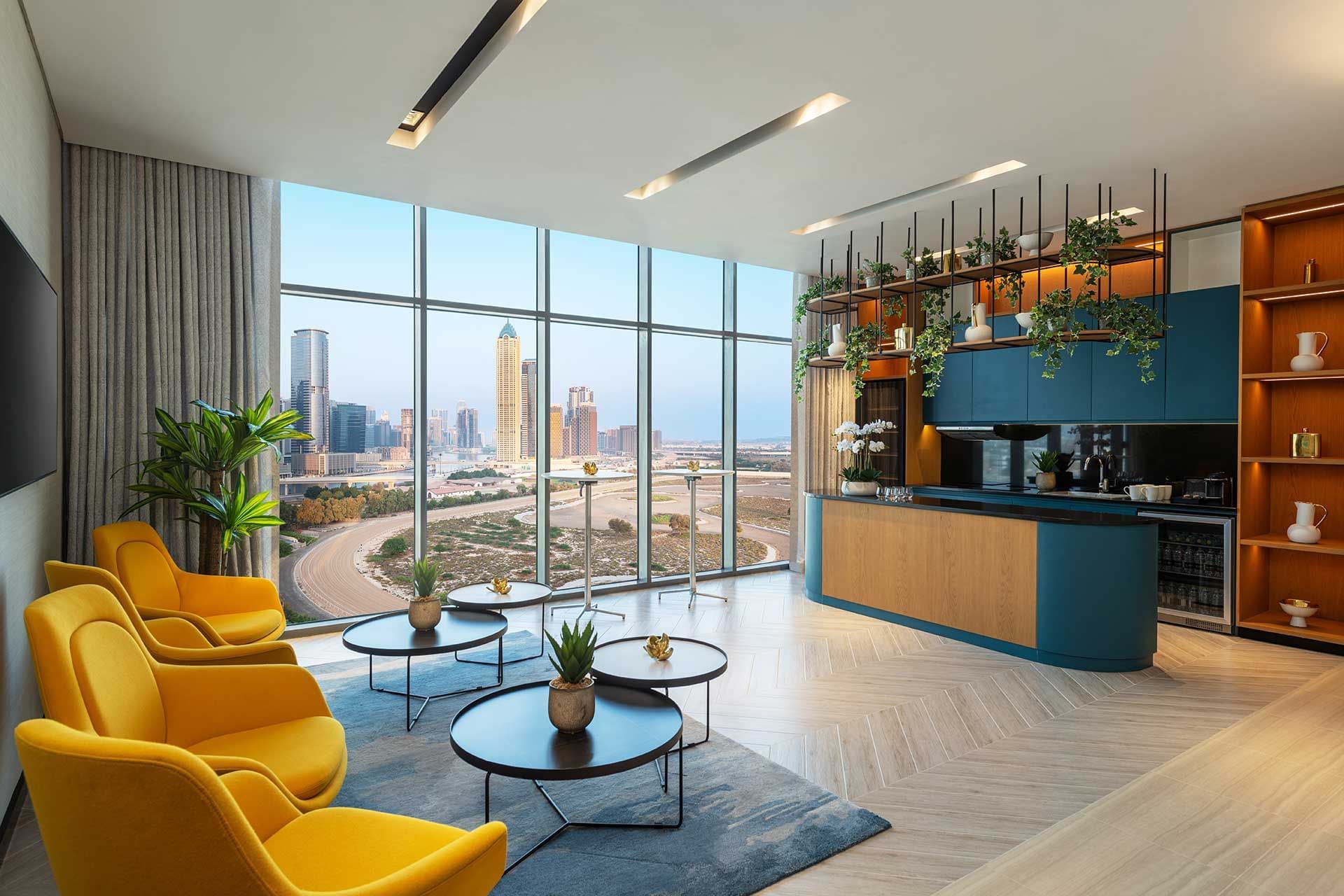 Interior view of the pre-function area with comfy seating at DAMAC Maison Aykon City