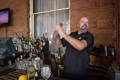 Bartender mixing drink