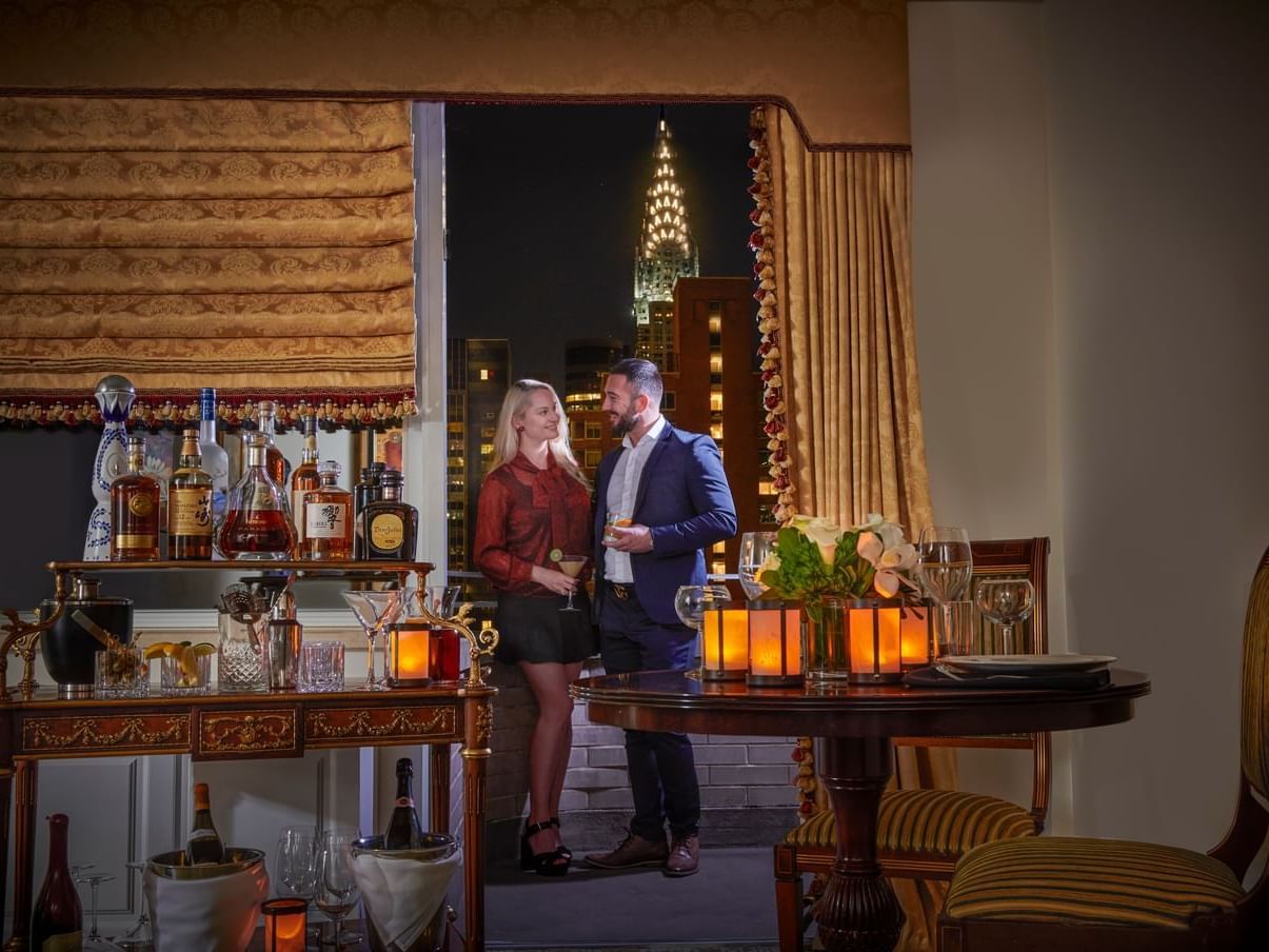 A couple near a bar at Kimberly Hotel