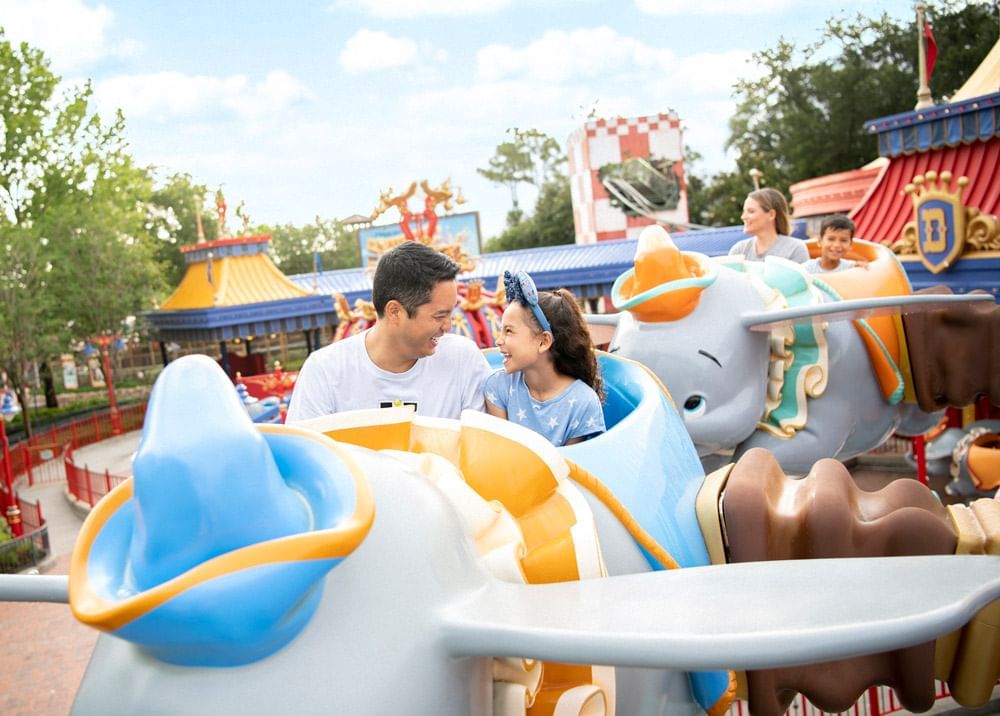 People enjoying the Flying Elephany Ride at Magic Kingdom near Lake Buena Vista Resort Village & Spa