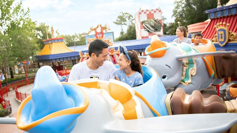 People enjoying the Flying Elephany Ride at Magic Kingdom near Lake Buena Vista Resort Village & Spa