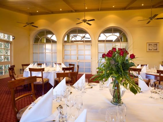 Elegantly arranged with rose banquet table with cutlery at Hotel Grand Chancellor Launceston