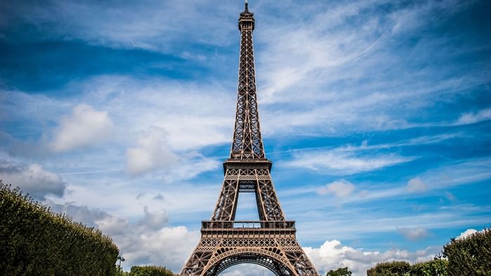 View of the famous Eiffel Tower in Paris near Originals Hotels