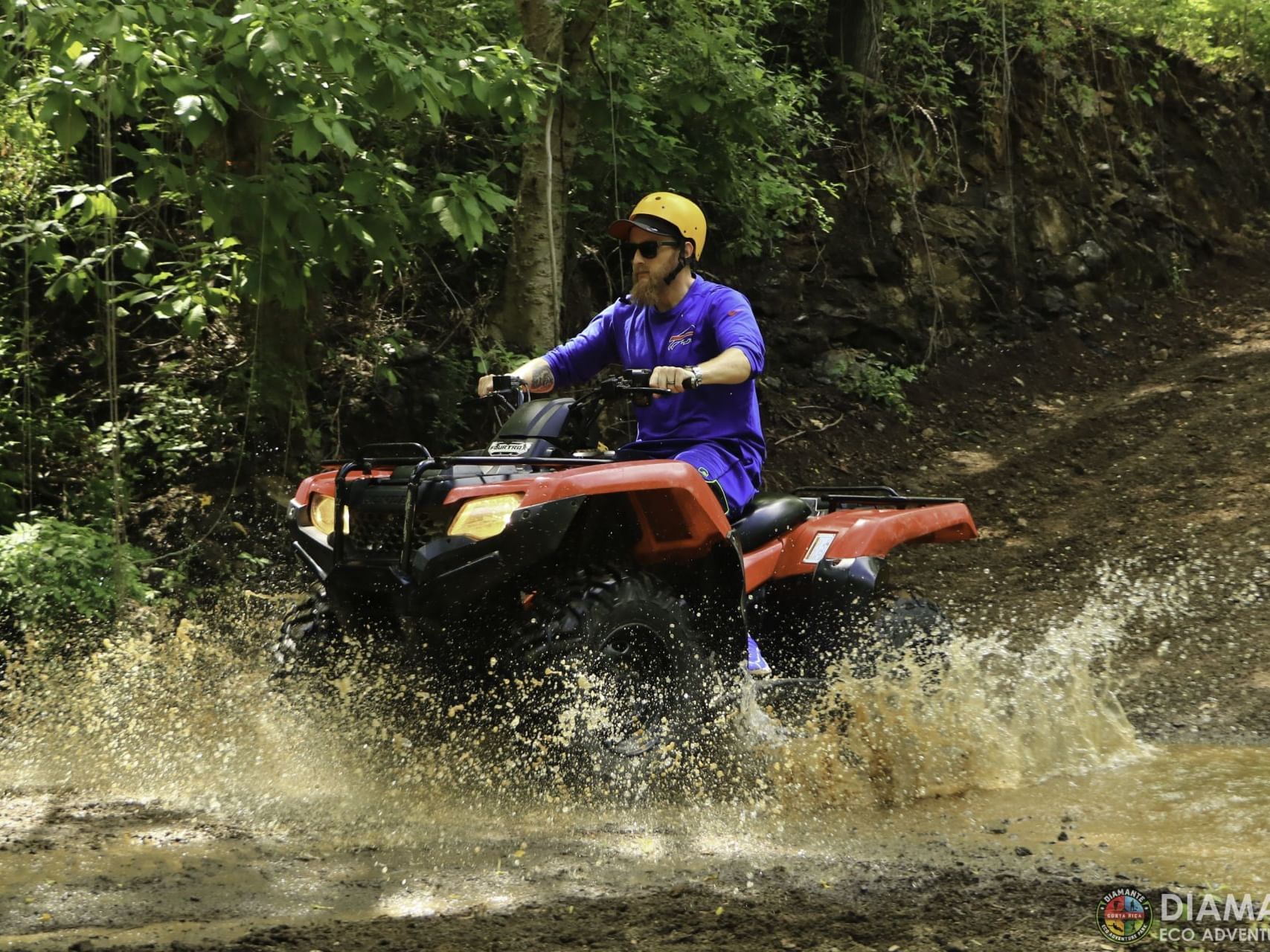 Man riding a Quad bike near Villas Sol Beach Resort