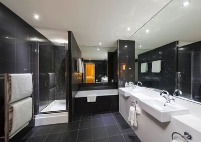 Bathtub, shower in Suite bathroom at Townhouse Hotel Manchester