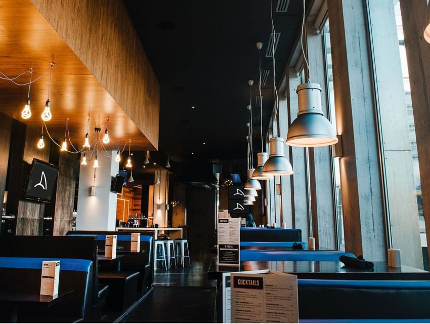 The Dining Area at the Sandman Signature Newcastle Hotel with bl