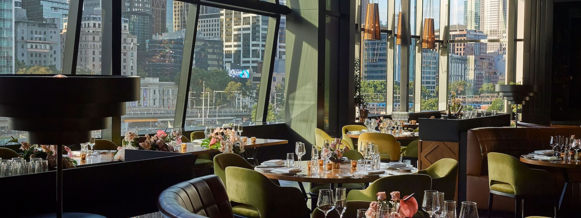A dining & lounge area in a restaurant at Crown Hotel Melbourne