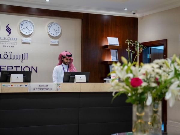 Reception desk with staff at Saja by Warwick Makkah.