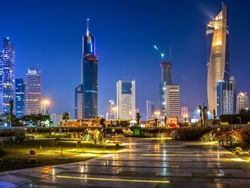 Al Shaheed Park at night near The Regency Hotel