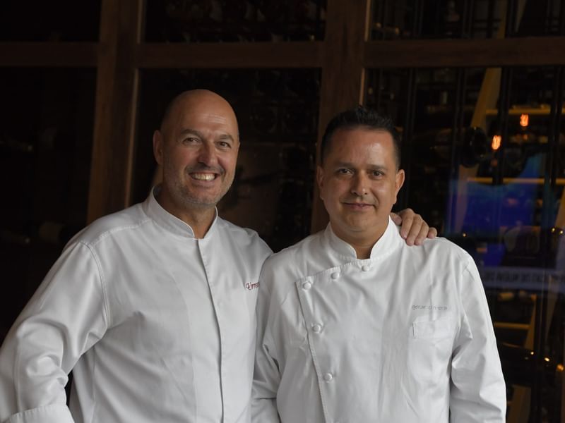 Two chefs in Live Seasonal Kitchen at Live Aqua Resorts and Residence Club